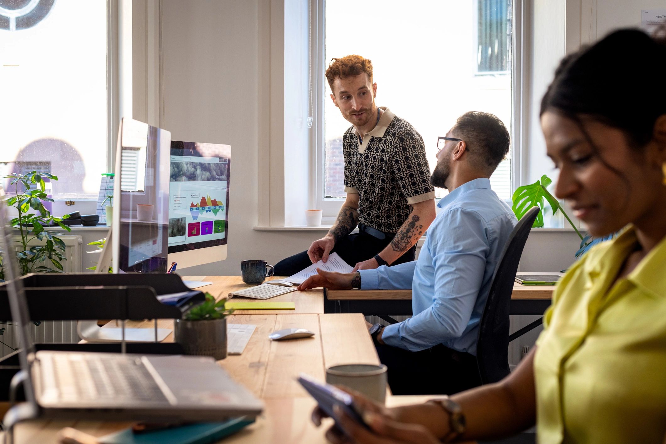 Public-sector professionals collaborating in a modern office